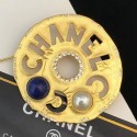 Chanel Round Metal Cutout Lettering Brooch AB1602 Gold/Blue 2019 Collection CE01343