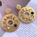 Fake Imitation Chanel Cut Out Chanel Logo Short Earrings Gold AB1602 2019 Collection CE00575