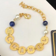 Imitation Chanel Round Metal Cutout Lettering Bracelet Gold/Blue 2019 Collection CE02369