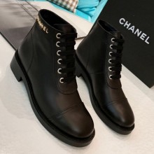 Chanel Calfskin Metal Logo Flat Short Boot Black 2019 Collection CE02316