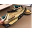 Copy Chanel Logo Metallic Lambskin and Fabric Sneakers G34086 Gold/Black 2019 CE03435