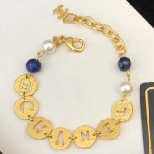 Imitation Chanel Round Metal Cutout Lettering Bracelet Gold/Blue 2019 Collection CE02369